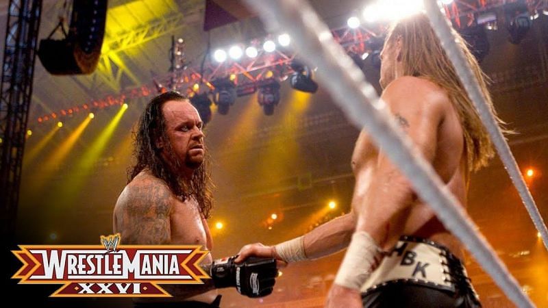 Two of the absolute best shaking hands in the middle of the ring